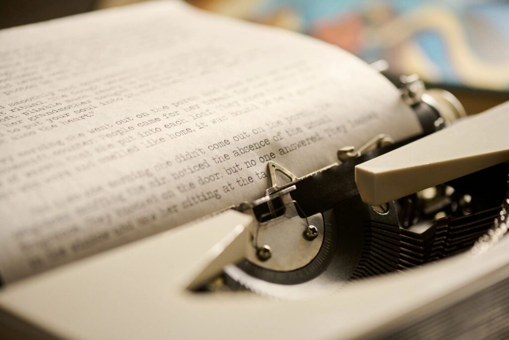 Close up of Vintage Typewriter Typing Document in Retro Office Setting