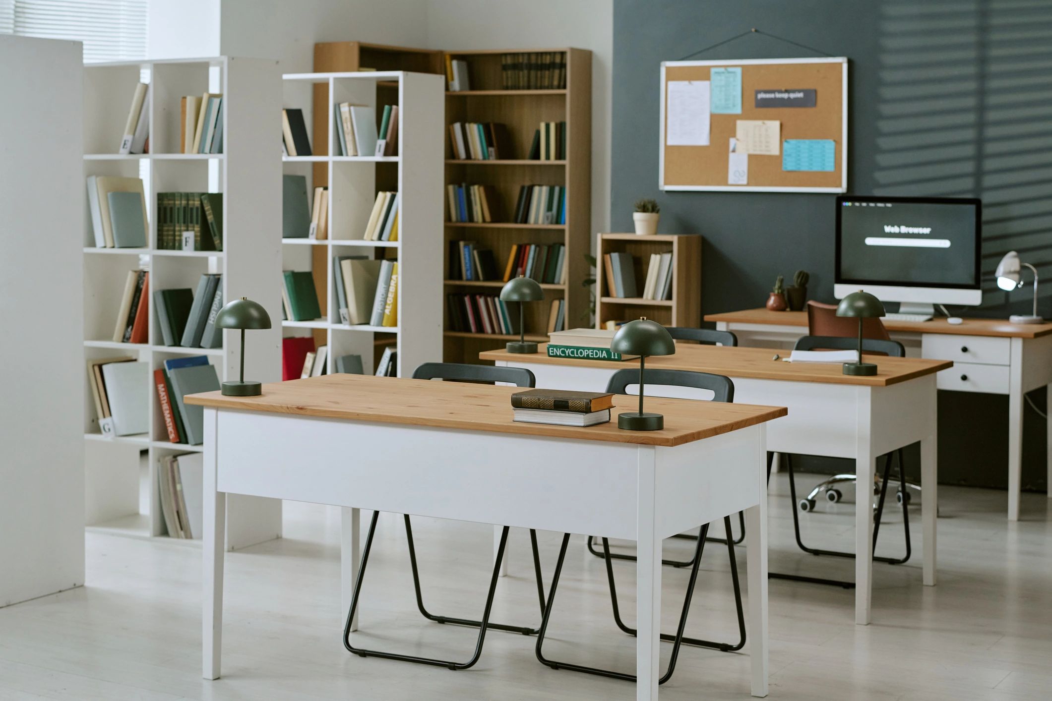 Classroom library with desks and bookshelves