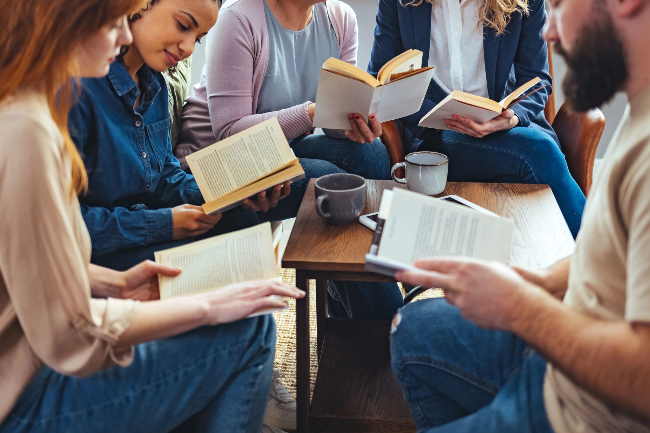 Group reading together in a library